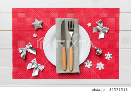Christmas dinner background with rustic decorations and kitchen utensil . View from above 82571518