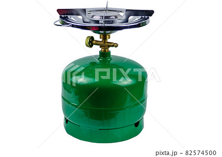 Green propane gas cylinder with burner isolated on white background 82574500