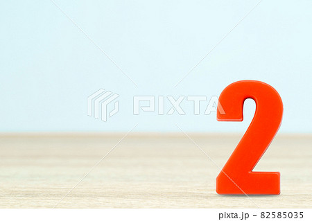 Shot of a number two made of red plastic Shot of a number two made of red plastic 82585035