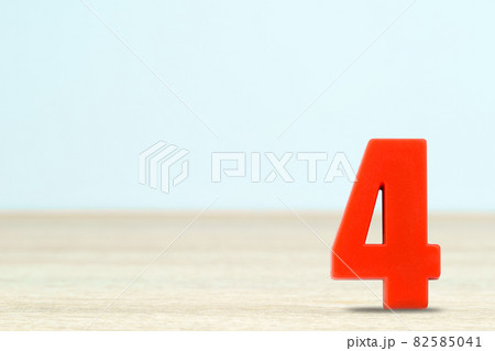 Shot of a number four made of red plastic 82585041