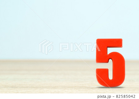 Shot of a number five made of red plastic Shot of a number five made of red plastic 82585042