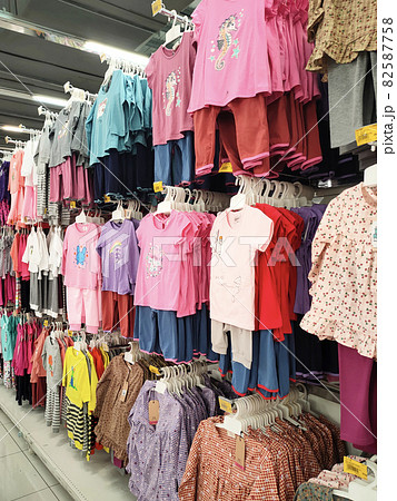SELANGOR, MALAYSIA - MARCH 29, 2021: Selected focused on children's clothing being sold in a supermarket. Has a price tag. Sorted by brand, type, size, and age. 82587758