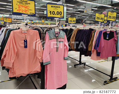 SELANGOR, MALAYSIA - MARCH 29, 2021: Selected focused on children's clothing being sold in a supermarket. Has a price tag. Sorted by brand, type, size, and age. SELANGOR, MALAYSIA - MARCH 29, 2021: Selected focused on children's clothing being sold in a supermarket. Has a price tag. Sorted by brand, type, size, and age. 82587772