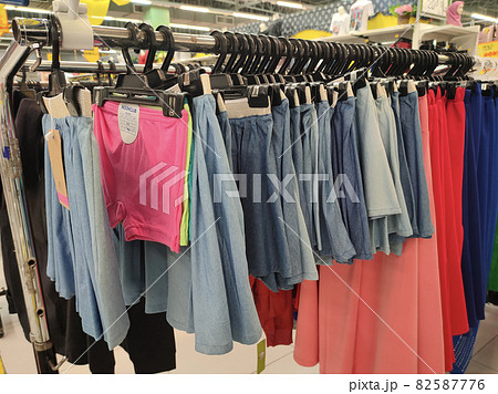 SELANGOR, MALAYSIA - MARCH 29, 2021: Selected focused on children's clothing being sold in a supermarket. Has a price tag. Sorted by brand, type, size, and age. SELANGOR, MALAYSIA - MARCH 29, 2021: Selected focused on children's clothing being sold in a supermarket. Has a price tag. Sorted by brand, type, size, and age. 82587776