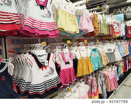 SELANGOR, MALAYSIA - MARCH 29, 2021: Selected focused on children's clothing being sold in a supermarket. Has a price tag. Sorted by brand, type, size, and age. 82587798