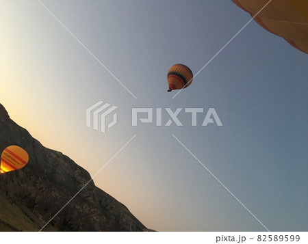 Hot air balloon ride at sunrise in Cappadocia  82589599