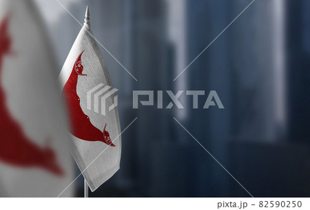 Small flags of Easter Island on a blurry background of the city 82590250