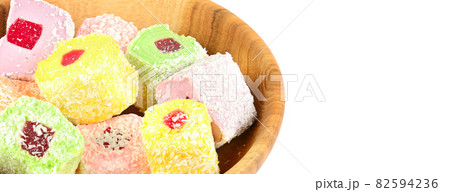 Turkish delight isolated on white.There is free space for your text. Wide photo. Turkish delight isolated on white.There is free space for your text. Wide photo. 82594236