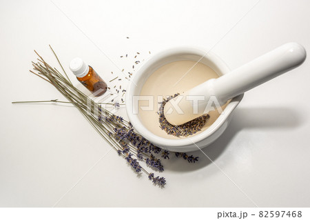 Lavender seeds in a white mortar. 82597468