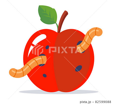 wormy red apple with a green leaf. 82599088