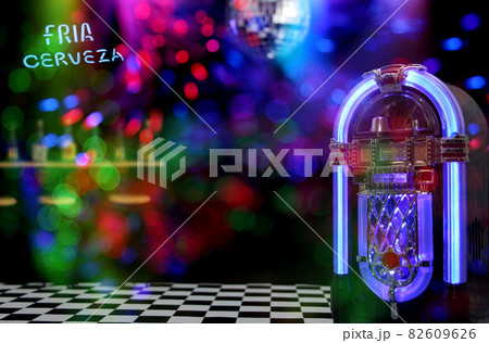Jukebox in Bar with Disco Ball and Bokeh Jukebox in Bar with Disco Ball and Bokeh 82609626