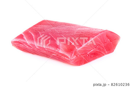 Raw tuna steaks on white background Raw tuna steaks on white background 82610236
