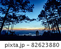 Silhouette couple with a beautifu mountain ridge and sky 82623880