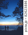 Silhouette couple with a beautifu mountain ridge and sky 82623886