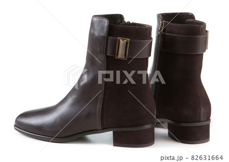brown ankle boots, combined, made of leather and suede, reverse side, on a white background 82631664