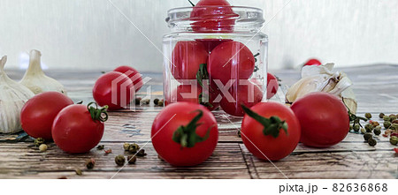 Preparations for the winter. Pickles. Preservation of tomatoes and cucumbers. Cucumbers and tomatoes in jars. 82636868