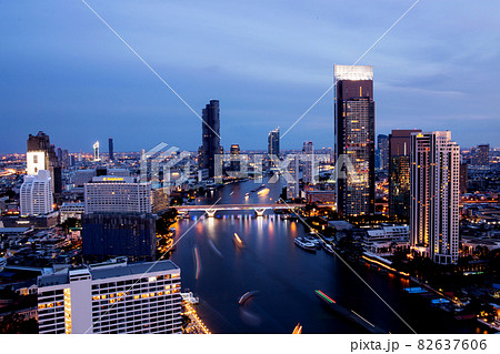 Bangkok THAILAND - July 11 2020 : View landscape of Bangkok tower with river in the evening. Bangkok THAILAND - July 11 2020 : View landscape of Bangkok tower with river in the evening. 82637606