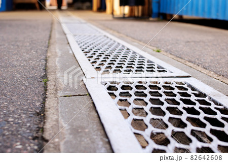 Stormwater storm on the road close up Stormwater storm on the road close up 82642608