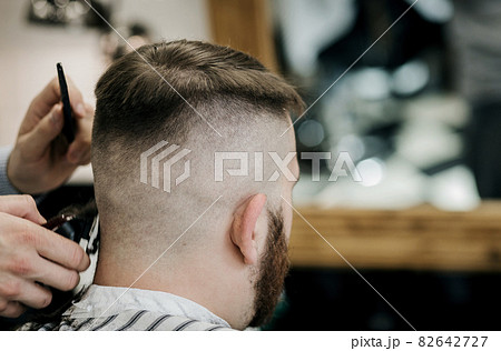 client at barber shop 82642727
