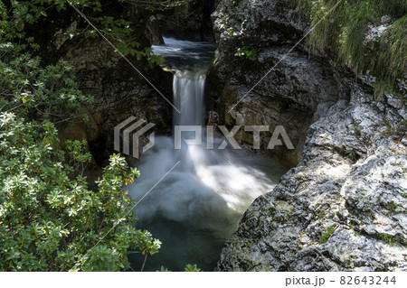 waterfalls of a river in the wood 82643244