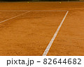 Corner of the ground tennis court with white lines 82644682