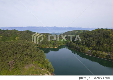 松本市美鈴湖から眺める北アルプス 松本市美鈴湖から眺める北アルプス 82653766