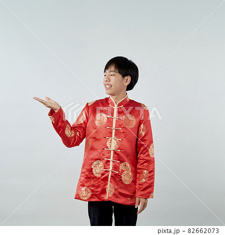 Asian man with Chinese traditional dress cheongsam 82662073