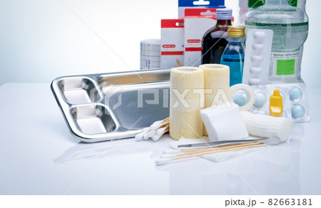 Wound care dressing set. Wound care equipment in hospital for nurse. Conform bandage, forceps, alcohol, cotton sticks, povidone-iodine for infection wound. Medical supply. Medical equipment for nurse. 82663181
