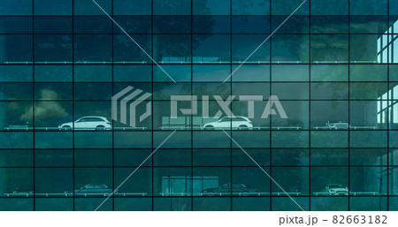 Luxury car parked at Multistory car park building. Multi-level parking garage. Indoor car parking lot. Glass building with green trees shadow of car park. Sustainable building. Eco-friendly building. 82663182