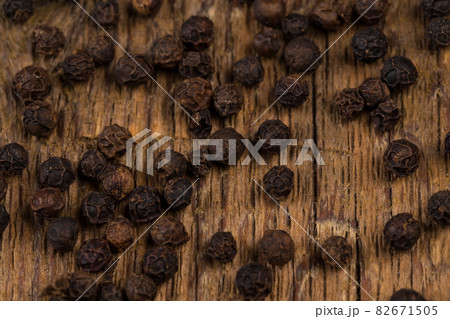 black pepper on wooden table black pepper on wooden table 82671505