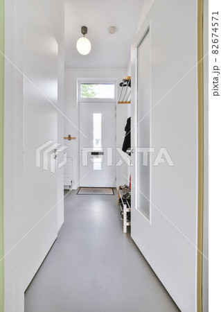 Designed in a minimalistic style long corridor 82674571