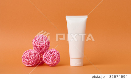 empty white plastic tubes for cosmetics. Packaging for cream, gel, serum, advertising and product promotion, mock up empty white plastic tubes for cosmetics. Packaging for cream, gel, serum, advertising and product promotion, mock up 82674694