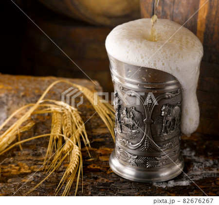 frothy beer mug in the cellar frothy beer mug in the cellar 82676267