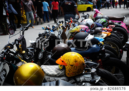 NEGERI SEMBILAN, MALAYSIA -MAY 21, 2016: Group of custom street cub motorcycle parked in public areas. Motorcycles were modified by the owner with his creativity. 82686576