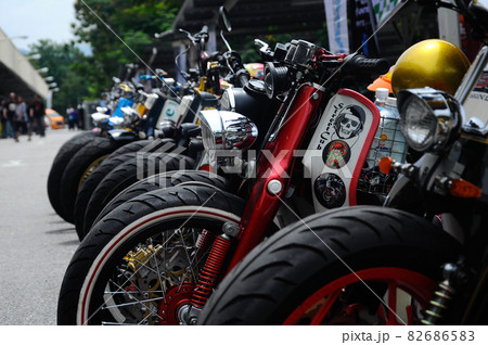 NEGERI SEMBILAN, MALAYSIA -MAY 21, 2016: Group of custom street cub motorcycle parked in public areas. Motorcycles were modified by the owner with his creativity. 82686583