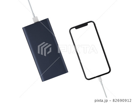 Power bank and smartphone on white background. The smartphone is charging from the power bank. Power bank and smartphone on white background. The smartphone is charging from the power bank. 82690912