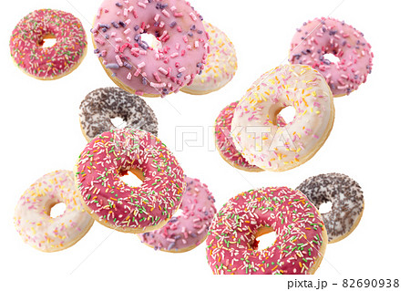 Donut close-up on a white background. Round donut isolated on white background. Donut close-up on a white background. Round donut isolated on white background. 82690938