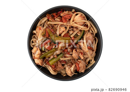Asian wok noodles on white background. Wok noodles close-up, top view. Asian wok noodles on white background. Wok noodles close-up, top view. 82690946