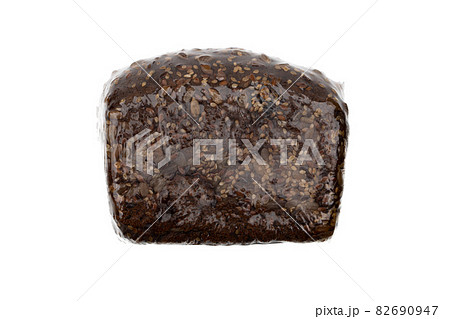 Bread in plastic packaging on a white background..Vacuum packed rye bread close-up. 82690947