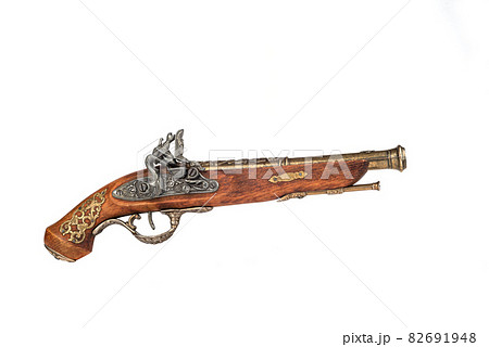 Side view of a mock-up of an antique pistol with bronze inlay. 82691948
