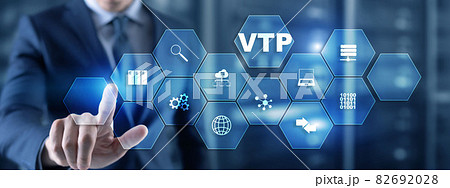 The man clicks on the inscription VTP. VLAN Trunking Protocol. Virtual Local Area Network 82692028
