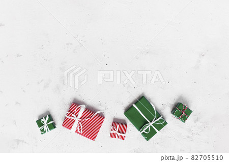 Christmas and New Year flat lay with various present gift boxes top view  82705510