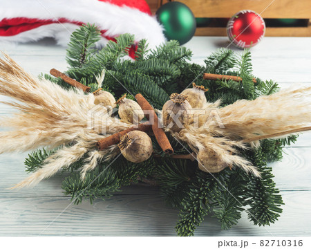Christmas natural spruce wreath with dry decor, pampas reed 82710316