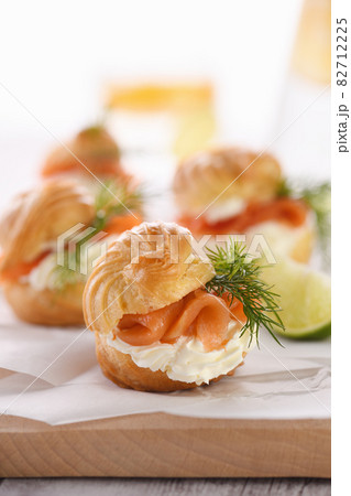 Profiteroles with salmon Profiteroles with salmon 82712225