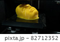 Modern technologies, 3d printer prints the yellow model of the head, the process of printing the face model on the 3d printer. 82712352