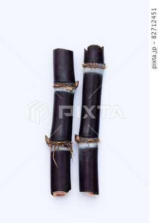 Sugar cane on white background. 82712451