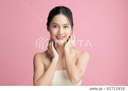 Beautiful young asian woman with clean fresh skin on pink background, Face care, Facial treatment, Beautiful young asian woman with clean fresh skin on pink background, Face care, Facial treatment, 82712858