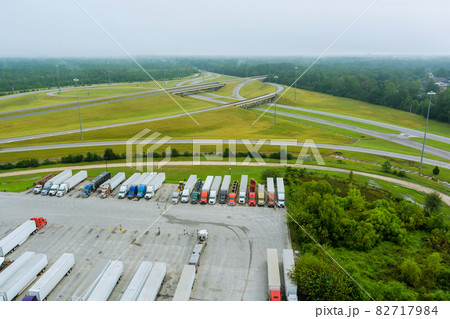 Aerial view of parking lot with trucks on transportation of truck rest area dock Aerial view of parking lot with trucks on transportation of truck rest area dock 82717984