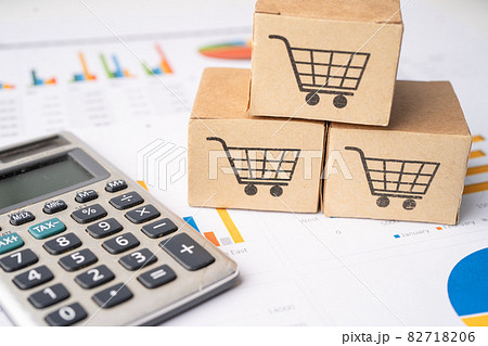 Shopping cart logo on box with magnifying glass on graph background. Banking Account, Investment Analytic research data economy, trading, Business import export transportation online company concept. Shopping cart logo on box with magnifying glass on graph background. Banking Account, Investment Analytic research data economy, trading, Business import export transportation online company concept. 82718206
