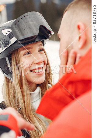 Winter snow couple in a mountains Winter snow couple in a mountains 82718735